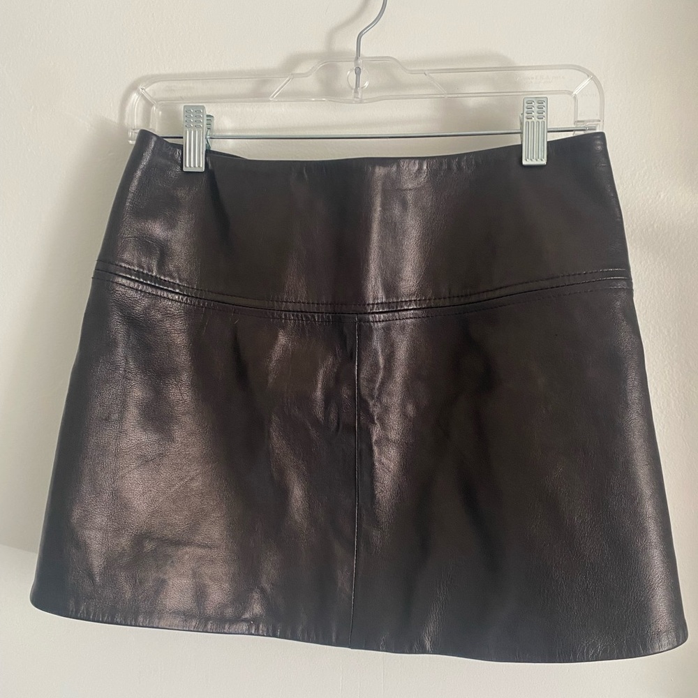 DVF Liam black mini leather skirt with button closure / zipper